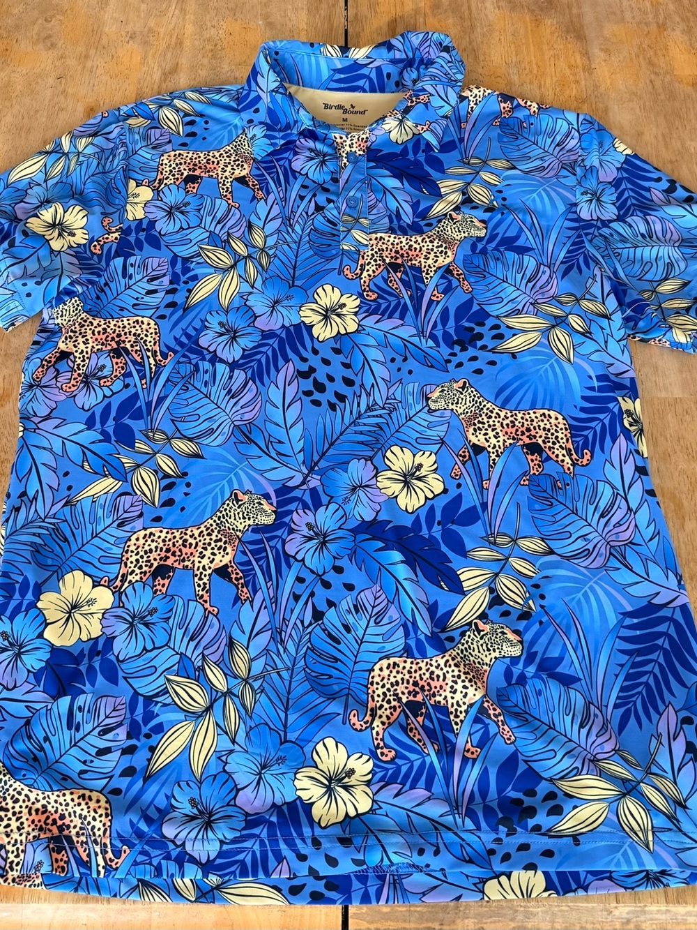 Birdie Bound Men's M jungle
Leopard azure blue Print Stretch
Golf Polo